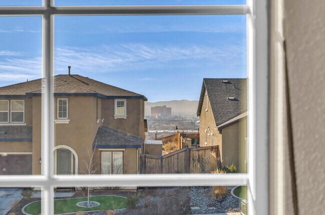 Building Photo - Sun-Filled, Spacious Living with a Three-Car Garage