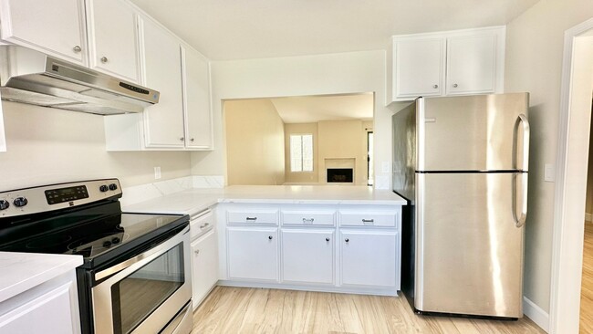 Building Photo - Fully Remodeled Upper Unit Condo in the De...