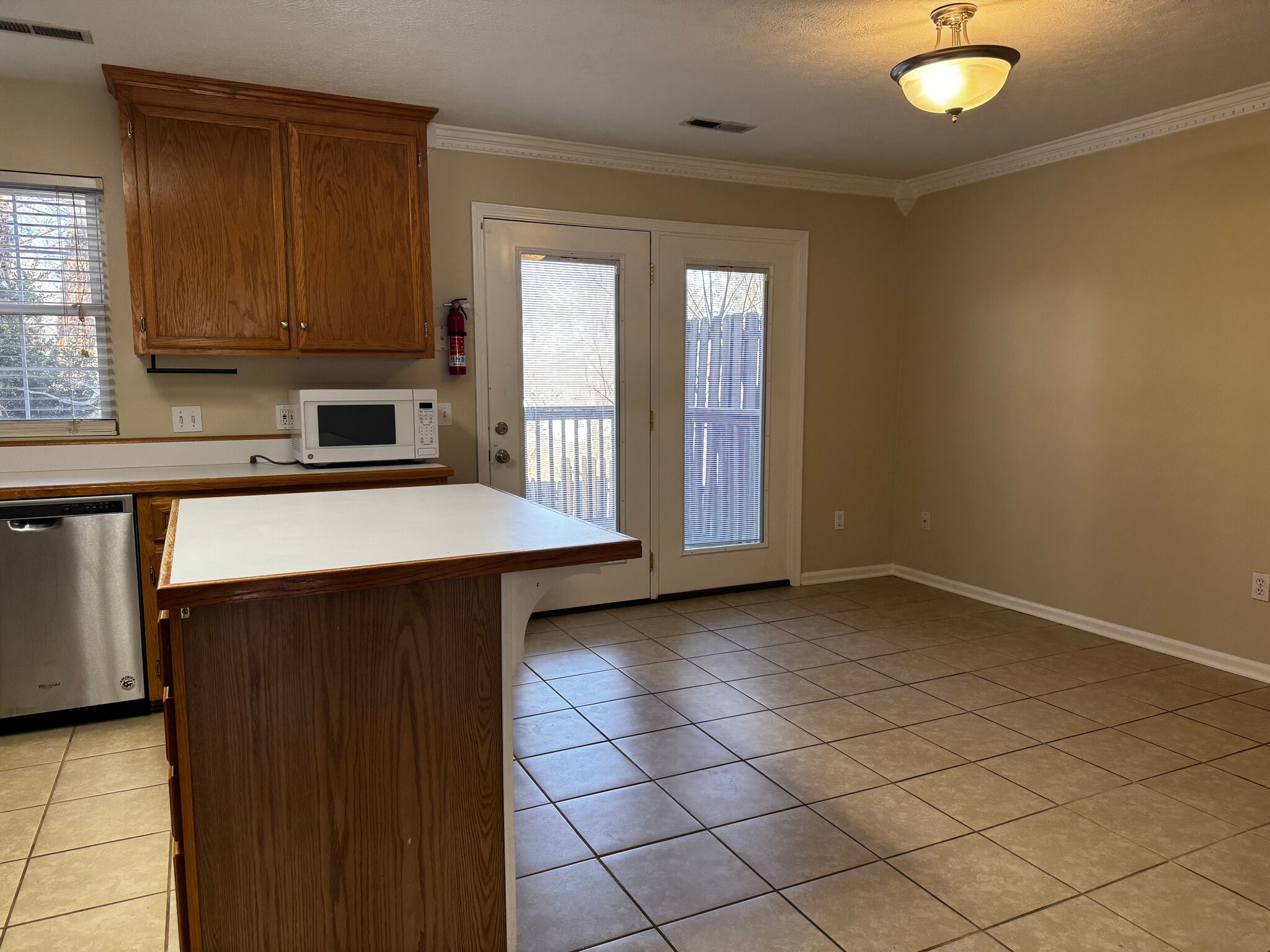 Kitchen and dining room doors to back deck - 855 S Grant St