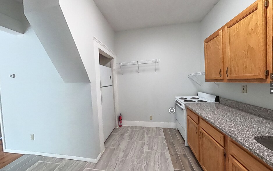 Kitchen includes Fridge and Range - 4224 South Washington Street