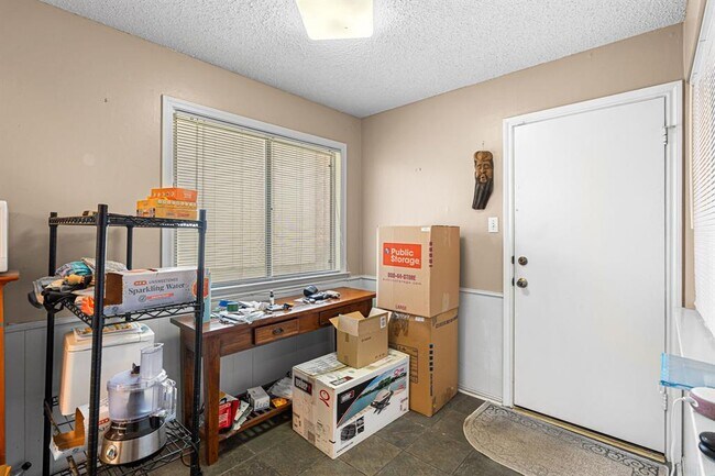 Building Photo - 8301 Greenslope Dr