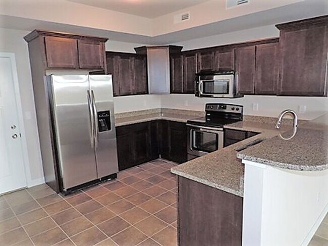 Building Photo - $2,000 | 3 Bedroom, 3 Bathroom Townhome | Pet Friendly | Available for August 1st, 2026 Move In!