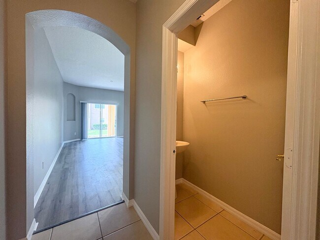 Building Photo - Gated 3B/2.5B Sanford Townhome ~ Fresh paint! ~ New flooring!