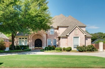 Building Photo - "Stately Gated 5-Bedroom Estate With Pool, Custom Details & Abundant Living Space!"