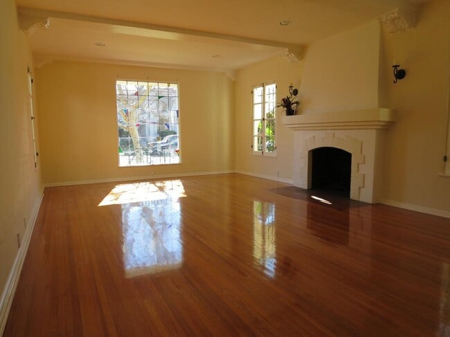 HIGHLITE: Your Formal Living Room with Wood-Burning Fireplace - 1103 S Crescent Heights Blvd