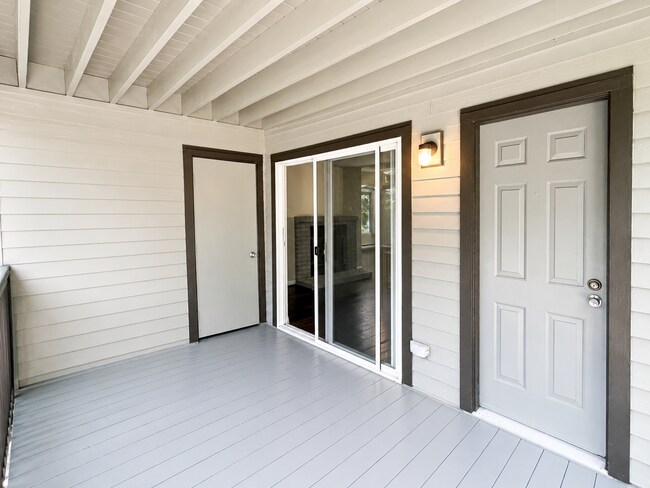 Building Photo - Modern Wooded Condo with Upgraded Kitchen & Private Deck
