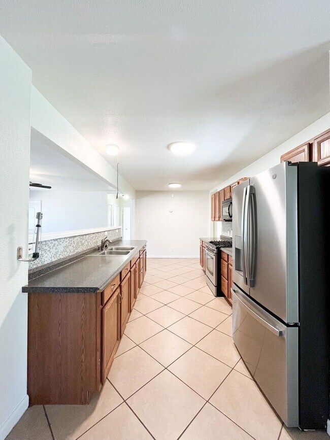 Building Photo - Available NOW!!!! Beautiful 3 bedroom, 2 bath home with covered patio and fenced yard.