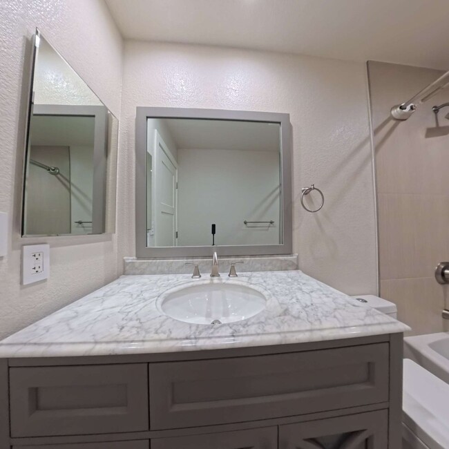 Building Photo - Highly Remodeled | Customer Closets | Gated Community