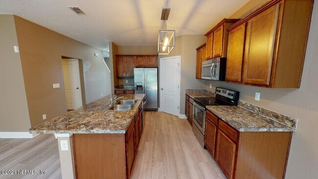 Building Photo - 65061 Lagoon Forest Dr