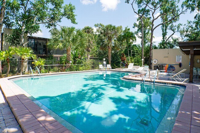 Building Photo - RARE ON MARKET , 2+den 2 1/2 bath overviewing a lake behind bell tower