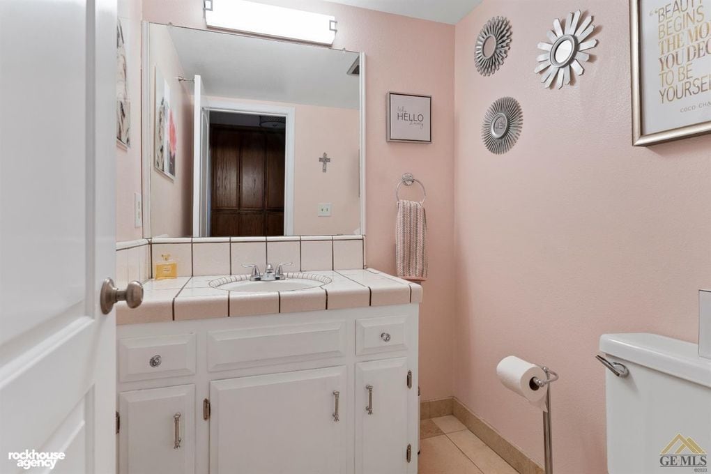 Downstairs half-bath. - 2323 Easthills Dr