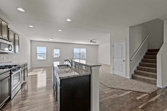 Building Photo - Spacious 5 Bedroom Home with 2-Car Garage,...