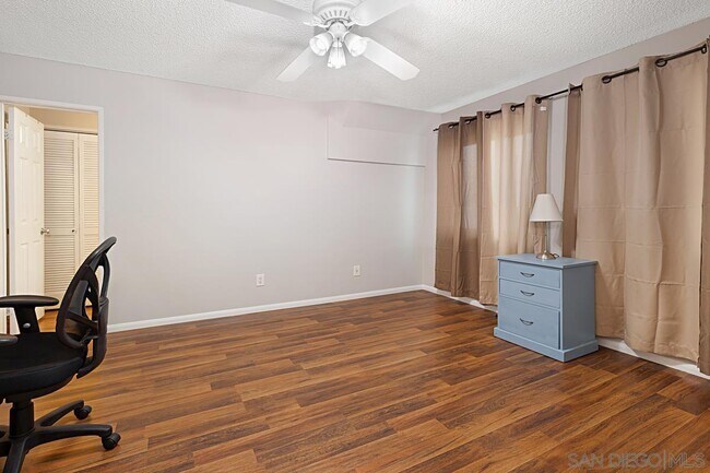 Building Photo - 7455 Charmant Dr