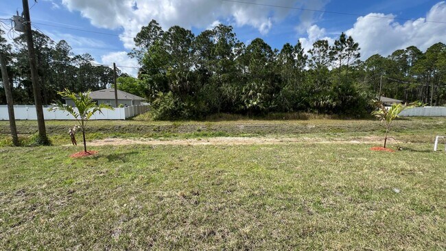 Building Photo - Smart & Stylish 3BD/2BA Palm Bay Home – Modern Upgrades, No Water Bills!