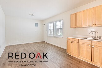 Building Photo - ~1 Month FREE~ Sun-Drenched One Bedroom wi...