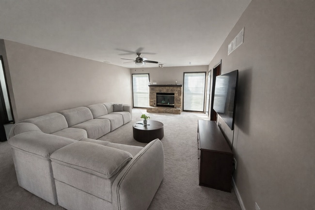 Building Photo - 4 Bed Lenexa Home w/ Finished Basement, Solar, 3 Car Garage and Fenced Yard!!