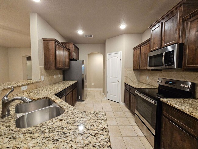 Building Photo - RENT REDUCTION - AVAILABLE NOW!