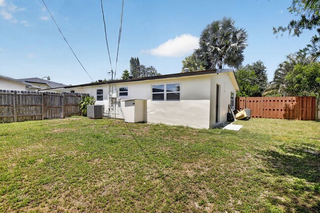 Building Photo - Renovated 3BR/2BA Corner Single-Family Home – Large Fenced Yard, NO HOA