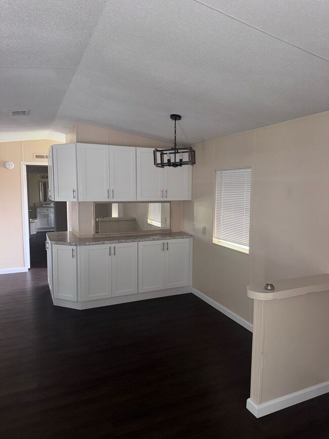 Building Photo - Woodland Estates MHP