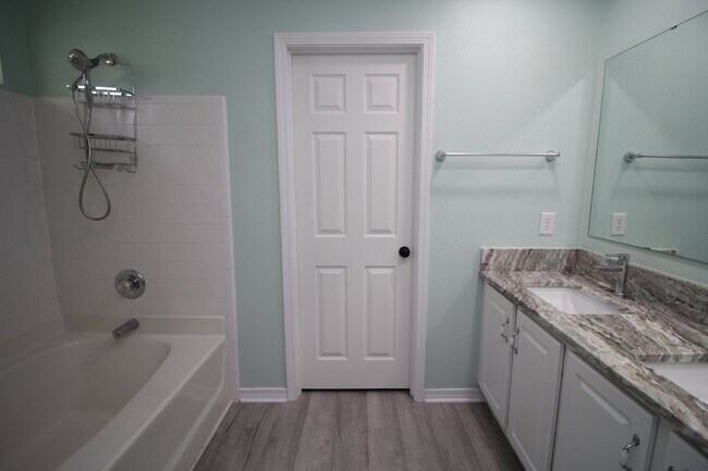 Building Photo - Updated Fox Hollow 3BR Home Near 9 Mile Rd with LVP Flooring, Granite Kitchen, 2-Car Garage & Fen...