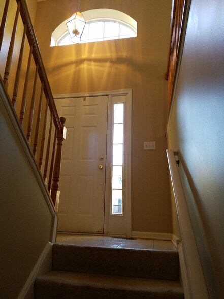 Basement view up to front landing - 135 Patrick Ave