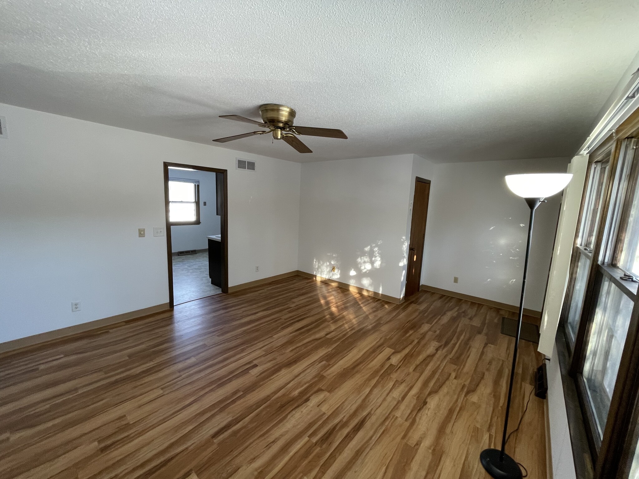 Living room, looking towards the kitchen and front door. There is also a nice size closet. - 715 Westgate St