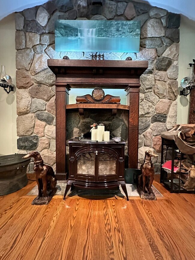 Building Photo - Dream Home in Highland, Michigan: Your Private Oasis on 5 Wooded Acres