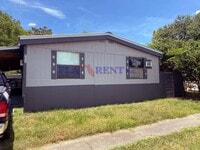 Building Photo - 3/2 Mobile Home with fenced yard