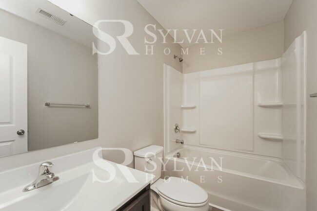 Building Photo - Come view this charming home