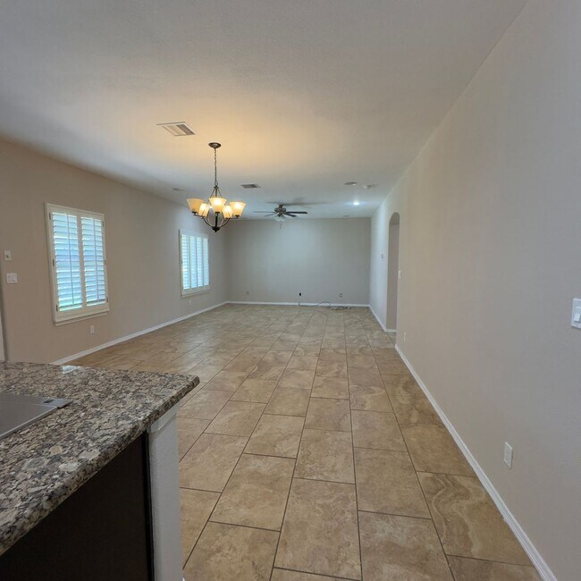 Building Photo - 4 Bedrooms, 3 Baths, a Pool, and Solar Panels!