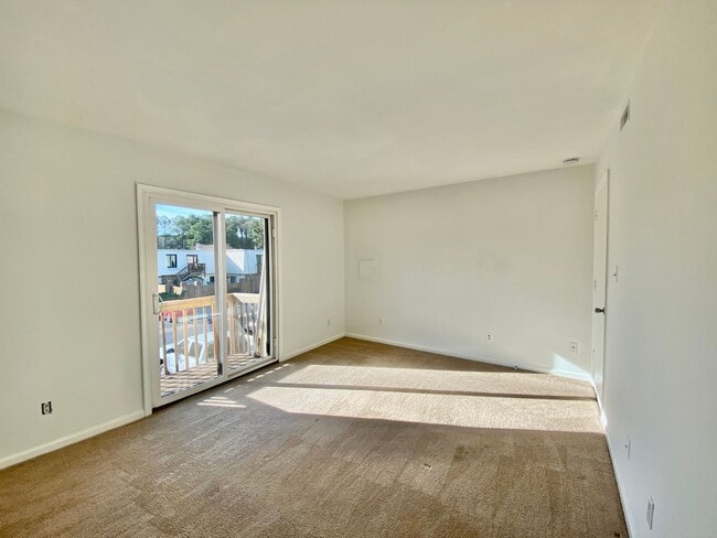 Building Photo - Spacious Condo One Mile to the Beach! One Living Level - Pet Friendly - Private Patio - Ready 05-...