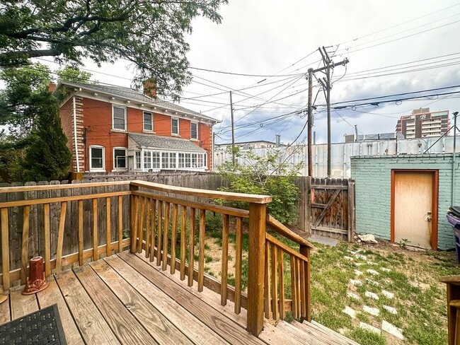 Building Photo - A home where old-world charm meets modern sophistication!