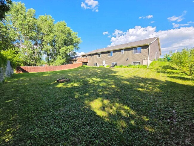 Building Photo - FREE SEPTEMBER RENT for this Spacious 4-Bedroom Home with Vaulted Ceilings with Finished Basement...