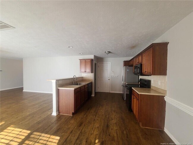 Building Photo - 5215 Woodpecker Dr