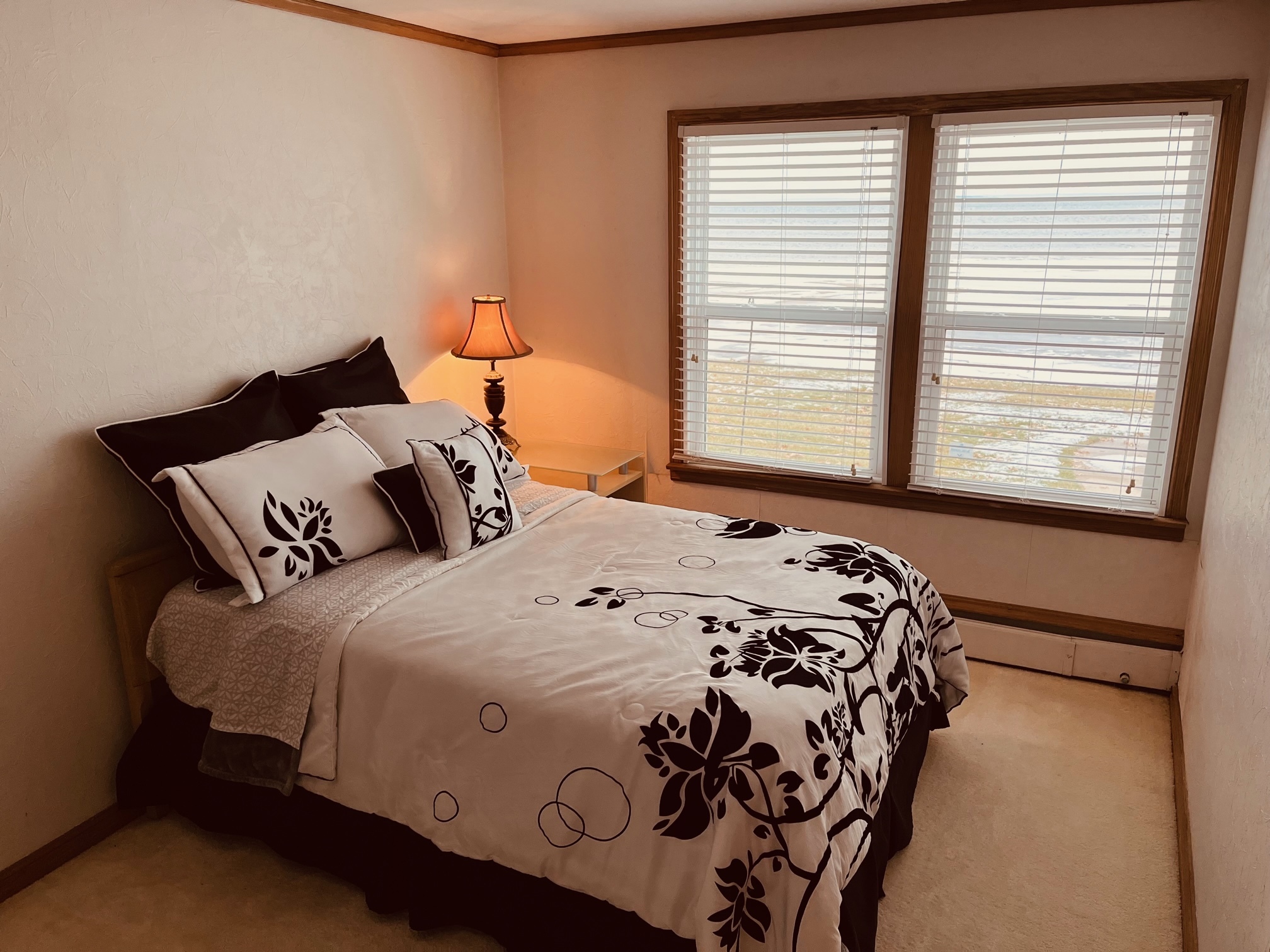 Second bedroom, queen bed with waterfront view - N3024 Woodland Rd