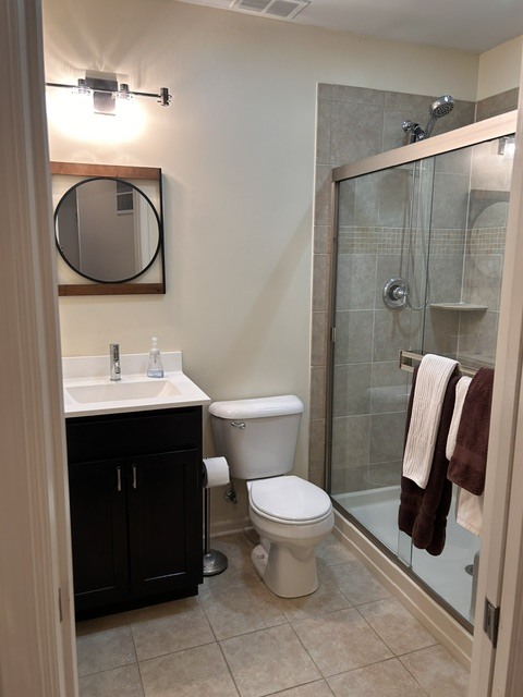 Large seated shower. 3.5' x 5" shower head at 7'. - 616 Windham Ln