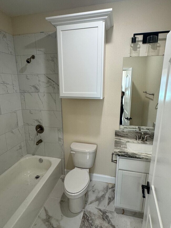 Building Photo - Beautiful modern Townhome in Peaster ISD NO Water Bill -  Fenced Yard - GATED: Spring Move in Spe...
