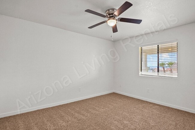 Building Photo - 2699 Smoketree Ave N