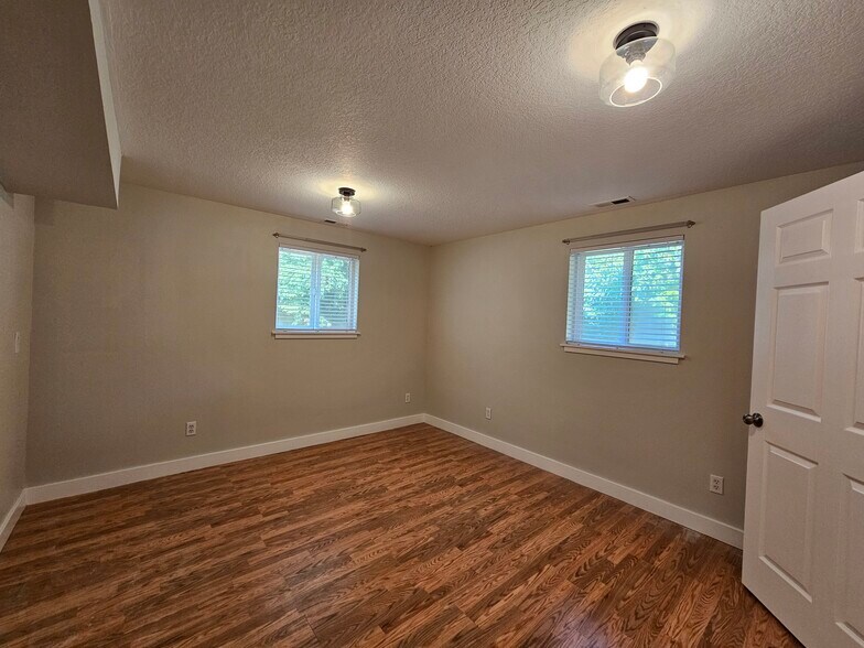 main level bedroom - different view - 13235 SE Oatfield Rd