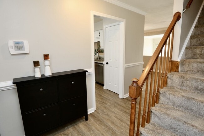Building Photo - Updated End-Unit Brick Townhome Ready NOW!...