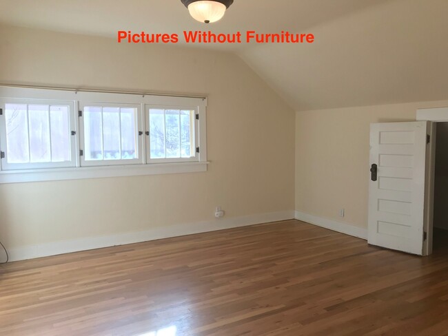 Building Photo - Spacious Top Floor One Bedroom Next To Cha...