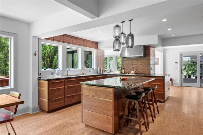 Building Photo - Stunning Updated Home with Private Pond Views in Chappaqua