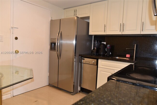 Building Photo - 5555 Collins Ave