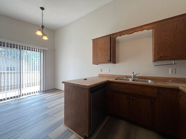 Building Photo - Spacious 2-Bed, 1-Bath Townhome with a Gar...