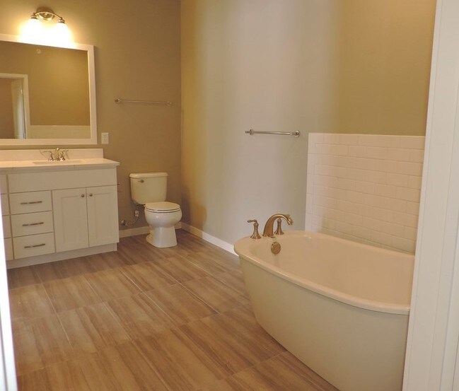 Building Photo - LUXURY CONDO - AVAILABLE NOW - MOVE IN PROMO