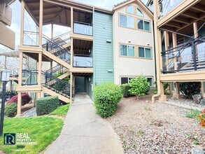 Building Photo - Updated 2 Bed Condo Near the Narrows – Water Views, Covered Parking & Prime Tacoma Location!