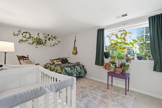 Building Photo - This beautifully refreshed condominium offers a refined blend of style and comfort