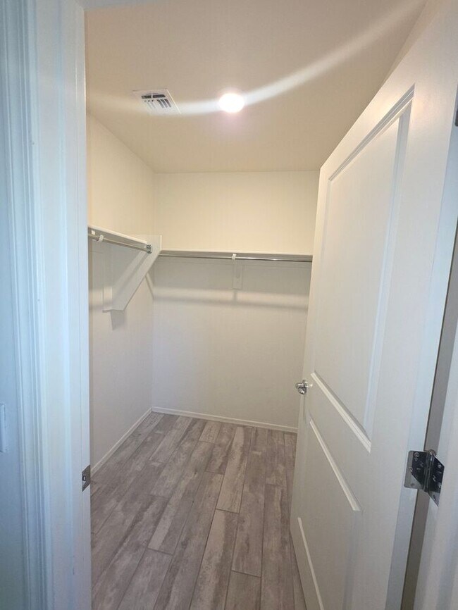 Building Photo - COMING SOON! New 3BR 2 BA Home w/ 2-Car Garage • Stainless Kitchen • Timer-Irrigated Yard in East...