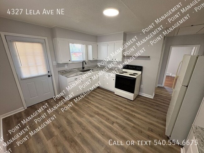 Building Photo - 4327 Lela Ave NE