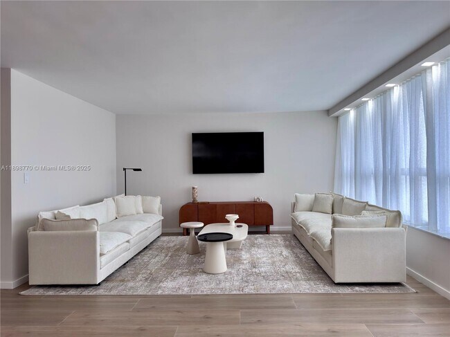 Building Photo - 10230 Collins Ave